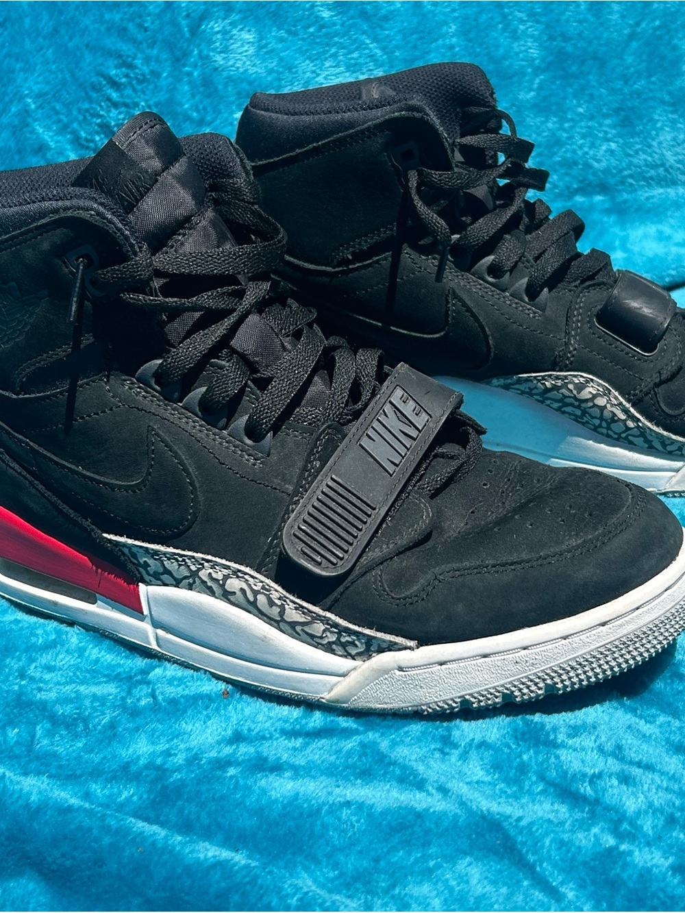 NIKE- Jordan’s Black Sneakers with Grey Elephant Print & Red Heel